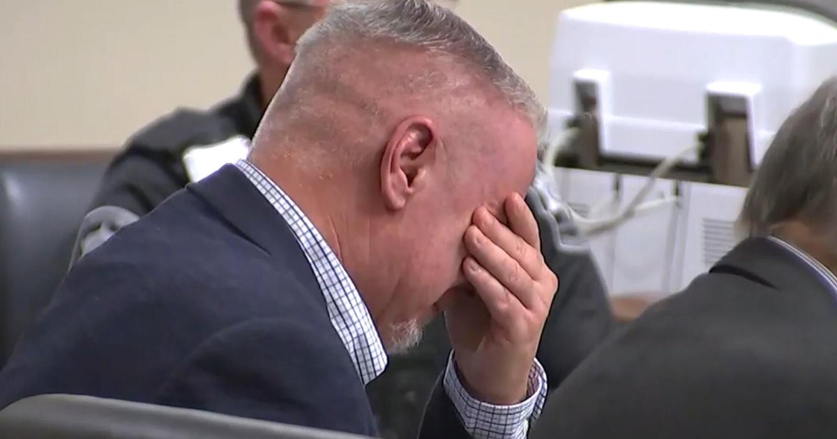 Father of alleged gunman breaks down as video of shooting is played at his trial